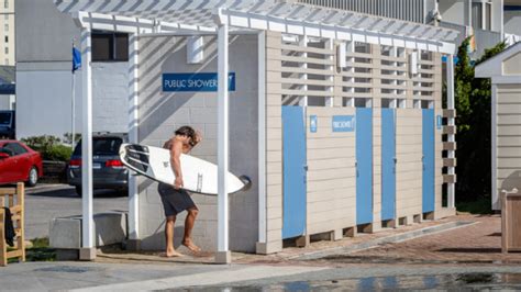 changing at beach|New public showers and changing stations open at Virginia Beach .